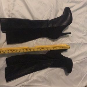 Tall heeled boots
